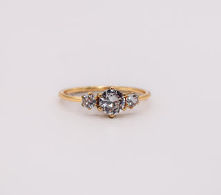 Anillo triple zirconias